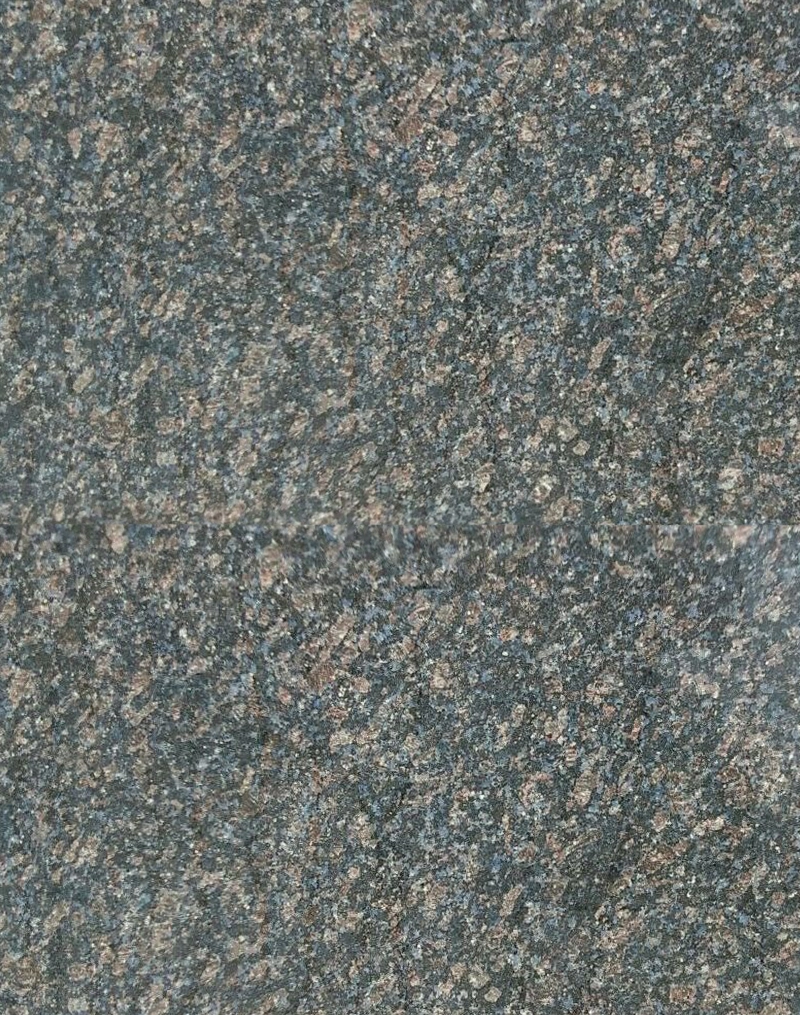 Honey Blue granite slab with elegant flowing pattern and soft blue hues